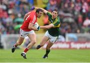 18 July 2015; James Loughrey, Cork, in action against David Moran, Kerry. Munster GAA Football Senior Championship Final Replay, Kerry v Cork. Fitzgerald Stadium, Killarney, Co. Kerry. Picture credit: Stephen McCarthy / SPORTSFILE