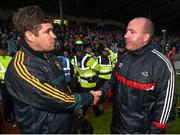 18 July 2015; Kerry manager Eamonn Fitzmaurice, left, and Cork manager Brian Cuthbert shake hands at the end of the game. Munster GAA Football Senior Championship Final Replay, Kerry v Cork, Fitzgerald Stadium, Killarney, Co. Kerry. Picture credit: Stephen McCarthy / SPORTSFILE