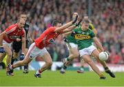 18 July 2015; James O’Donoghue, Kerry, in action against Mark Collins, Cork. Munster GAA Football Senior Championship Final Replay, Kerry v Cork, Fitzgerald Stadium, Killarney, Co. Kerry. Picture credit: Brendan Moran / SPORTSFILE