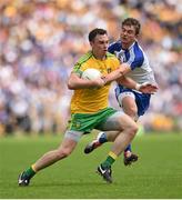 19 July 2015; Martin McElhinney, Donegal, in action against Dessie Mone, Monaghan. Ulster GAA Football Senior Championship Final, Donegal v Monaghan, St Tiernach's Park, Clones, Co. Monaghan. Picture credit: Stephen McCarthy / SPORTSFILE