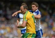 19 July 2015; Colm McFadden, Donegal, in action against Dessie Mone, Monaghan. Ulster GAA Football Senior Championship Final, Donegal v Monaghan, St Tiernach's Park, Clones, Co. Monaghan. Picture credit: Dáire Brennan / SPORTSFILE