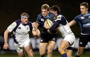 24 October 2008; Glasgow Warriors' John Barclays holds off the tackles of Leinster's Shane Horgan and Jamie Heaslip. Magners League, Glasgow Warriors v Leinster, Firhill Arena, Glasgow, Scotland. Picture credit: Dave Gibson / SPORTSFILE