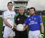 26 October 2008; Dromore captain Fabian O'Neill shakes hands with Colm Donnelly, Clonoe, with referee Bert Mohan. Tyrone Senior Football Final, Dromore v Clonoe, Healy Park, Omagh, Co. Tyrone. Picture credit: Michael Cullen / SPORTSFILE