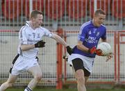 26 October 2008; Paddy Montague, Dromore, in action against Gary Coney, Clonoe. Tyrone Senior Football Final, Dromore v Clonoe, Healy Park, Omagh, Co. Tyrone. Picture credit: Michael Cullen / SPORTSFILE