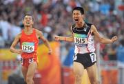 15 September 2008; Hong Kong's Wa Wai So celebrates as he crosses the line to win the Men's 200m - T36 final in a world record time of 24.65, ahead of 3rd place China's Mian Che. Beijing Paralympic Games 2008, Men's 200m - T36 final, National Stadium, Olympic Green, Beijing, China. Picture credit: Brian Lawless / SPORTSFILE