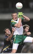 24 October 2008; Australia players Michael Firrito, left, and Adam Selwood vie with Ireland's Kieran Donaghy for possession. 2008 Toyota International Rules Series, Australia v Ireland, Subiaco Oval, Perth, Western Australia. Picture credit: Ray McManus / SPORTSFILE