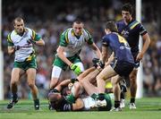 24 October 2008; Grahan Canty, Ireland, is tackled by Scott Thompson, Australia. 2008 Toyota International Rules Series, Australia v Ireland, Subiaco Oval, Perth, Western Australia. Picture credit: Ray McManus / SPORTSFILE