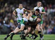 24 October 2008; Benny Coulter, Ireland, is tackled by Australian players Adam Selwood, left, and Michael Firrito. 2008 Toyota International Rules Series, Australia v Ireland, Subiaco Oval, Perth, Western Australia. Picture credit: Ray McManus / SPORTSFILE