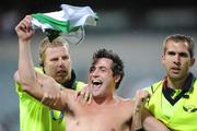 24 October 2008; A supporter is escorted off the field after the game. 2008 Toyota International Rules Series, Australia v Ireland, Subiaco Oval, Perth, Western Australia. Picture credit: Ray McManus / SPORTSFILE