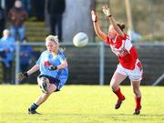 26 October 2008; Trease Doherty, Moville, in action against Joanne Geoghegan, Donaghmoyne. VHI Healthcare Ulster Senior Ladies Football Final, Donaghmoyne, Monaghan v Moville, Donegal, Gallbally, Co. Tyrone. Picture credit: Oliver McVeigh / SPORTSFILE
