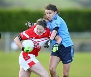 26 October 2008; Cathriona McConnell, Donaghmoyne, in action against Niamh Hegarty, Moville. VHI Healthcare Ulster Senior Ladies Football Final, Donaghmoyne, Monaghan v Moville, Donegal, Gallbally, Co. Tyrone. Picture credit: Oliver McVeigh / SPORTSFILE