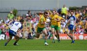 19 July 2015; Karl Lacey, Donegal, in action against Ryan Wylie, Monaghan. Ulster GAA Football Senior Championship Final, Donegal v Monaghan, St Tiernach's Park, Clones, Co. Monaghan. Picture credit: Dáire Brennan / SPORTSFILE