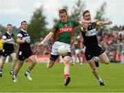 19 July 2015; Donal Vaughan, Mayo, in action against Kevin McDonnell, Sligo. Connacht GAA Football Senior Championship Final, Mayo v Sligo, Dr. Hyde Park, Roscommon. Picture credit: David Maher / SPORTSFILE