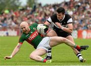 19 July 2015; Tom Cunniffe, Mayo, in action against Pat Hughes, Sligo. Connacht GAA Football Senior Championship Final, Mayo v Sligo, Dr. Hyde Park, Roscommon. Picture credit: David Maher / SPORTSFILE