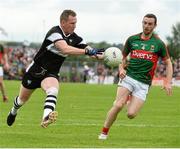 19 July 2015; Adrian Marren, Sligo, in action against Keith Higgins, Mayo. Connacht GAA Football Senior Championship Final, Mayo v Sligo, Dr. Hyde Park, Roscommon. Picture credit: David Maher / SPORTSFILE