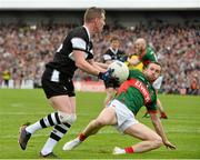 19 July 2015; Adrian Marren, Sligo, in action against Keith Higgins, Mayo. Connacht GAA Football Senior Championship Final, Mayo v Sligo, Dr. Hyde Park, Roscommon. Picture credit: David Maher / SPORTSFILE