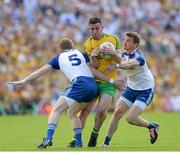19 July 2015; Patrick McBrearty, Donegal, in action against Cloin Walshe and Dessie Mone, Monaghan. Ulster GAA Football Senior Championship Final, Donegal v Monaghan, St Tiernach's Park, Clones, Co. Monaghan. Picture credit: Oliver McVeigh / SPORTSFILE