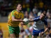 19 July 2015; Éamonn McGee, Donegal, in action against Kieran Hughes, Monaghan. Ulster GAA Football Senior Championship Final, Donegal v Monaghan, St Tiernach's Park, Clones, Co. Monaghan. Picture credit: Dáire Brennan / SPORTSFILE