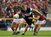 19 July 2015; Kevin McDonnell, Sligo, in action against Aidan O'Shea, left, and Alan Dillon, Mayo. Connacht GAA Football Senior Championship Final, Mayo v Sligo, Dr. Hyde Park, Roscommon. Photo by Sportsfile