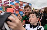 19 July 2015; Aidan O'Shea, Mayo, celebrates with supporters after the game. Connacht GAA Football Senior Championship Final, Mayo v Sligo, Dr. Hyde Park, Roscommon. Photo by Sportsfile