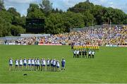 19 July 2015; The Monaghan and Donegal players line up for the national anthem before the game. Ulster GAA Football Senior Championship Final, Donegal v Monaghan, St Tiernach's Park, Clones, Co. Monaghan. Picture credit: Dáire Brennan / SPORTSFILE