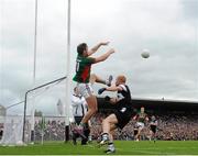 19 July 2015; Aidan O'Shea, Mayo, in action against Ross Donavan, Sligo. Connacht GAA Football Senior Championship Final, Mayo v Sligo, Dr. Hyde Park, Roscommon. Picture credit: David Maher / SPORTSFILE