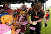14 July 2015; Young players from Dicksboro GAA Club get autographs from Cillian Buckley, Kilkenny, at the launch of the GAA Hurling All-Ireland Senior Championship Series 2015. Dicksboro GAA club, Kilkenny. Picture credit: Brendan Moran / SPORTSFILE