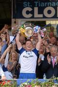 19 July 2015; Monaghan captain Conor McManus lifts the Anglo Celt cup. Ulster GAA Football Senior Championship Final, Donegal v Monaghan, St Tiernach's Park, Clones, Co. Monaghan. Picture credit: Oliver McVeigh / SPORTSFILE