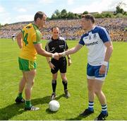 19 July 2015; Referee David Coldrick with Donegal captain Michael Murphy, left, and Monaghan captain Conor McManus before the game. Ulster GAA Football Senior Championship Final, Donegal v Monaghan, St Tiernach's Park, Clones, Co. Monaghan. Picture credit: Oliver McVeigh / SPORTSFILE