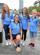 20 July 2015; AIG Insurance today marked their sponsorships of Dublin GAA, Tennis Ireland, New Zealand Rugby, the Golfing Union of Ireland and Irish Ladies Golf Union with an event like no other, the AIG Insurance Summer Splash in Grand Canal Dock. Dublin GAA stars, Bernard Brogan, Johnny McCaffrey, Cian Boland, Sinéad Goldrick and Ali Twomey were joined by former Munster and New Zealand All Black legend Doug Howlett, Irish amateur golfing twins, Leona and Lisa Maguire, and Irish tennis player Jenny Claffey to test their skills in this specially designed skills competition. To celebrate the event, AIG Insurance announced up to 15% discounts on their car, home and travel insurance products, to members of sporting clubs across their sponsorship partners. These are available at www.aig.ie/dubs or on 1890 50 27 27. Pictured are Dublin camogie player Ali Twomie with, from left to right, Evie Weir, age 13, Kerri Weir, age 11, and Sean Weir, age 9. Grand Canal Dock, Dublin. Picture credit: Cody Glenn / SPORTSFILE