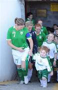 26 October 2008; Republic of Ireland captain Ciara Grant leads her side and the team mascots onto the pitch before the game. Women's Euro 2009 Championship Play-Offs, 1st Leg, Republic of Ireland v Iceland, Richmond Park, Dublin. Picture credit: Brendan Moran / SPORTSFILE
