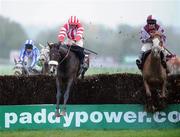 29 October 2008; Forpadydeplasterer, centre, with Davy Russell up, jumps the last on the way to winning the Panoramic Restaurant Beginners Steeplechase, from second place Clarified, right, with Barry Geraghty up. Punchestown Racecourse, Naas, Co. Kildare. Picture credit: Matt Browne / SPORTSFILE