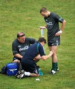 27 October 2008; John Keane, Westmeath, receives attention from physio Frank Foley and Mocky Regan during an Ireland International Rules training session. 2008 International Rules tour, Stribling Reserve, Lorne, Victoria, Auatralia. Picture credit: Ray McManus / SPORTSFILE