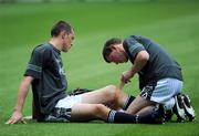 28 October 2008; Irish physio Frank Foley straps up Kieran Donaghy's knee during an Ireland International Rules training session. 2008 International Rules tour, Melbourne Cricket Ground, Melbourne, Auatralia. Picture credit: Ray McManus / SPORTSFILE