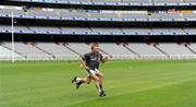 28 October 2008; John Keane, Westmeath, who took little part in the session, runs the pitch with Irish 'runner' Sean Marty Lockhard during an Ireland International Rules training session. 2008 International Rules tour, Melbourne Cricket Ground, Melbourne, Auatralia. Picture credit: Ray McManus / SPORTSFILE