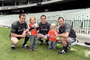 28 October 2008; Two-year-old Nalani Gough and her brother Finlay, age 4, from Newtownhamilton, Co. Armagh, with Armagh stars Ciaran McKeever, Aaron Kernan and Steven McDonnell after an Ireland International Rules training session. 2008 International Rules tour, Melbourne Cricket Ground, Melbourne, Auatralia. Picture credit: Ray McManus / SPORTSFILE