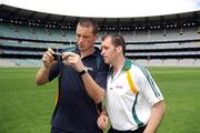 28 October 2008; Kieran Donaghy, Kerry, and Ciaran McKeever, Armagh, review photographs taken on the pitch after an Ireland International Rules training session. 2008 International Rules tour, Melbourne Cricket Ground, Melbourne, Auatralia. Picture credit: Ray McManus / SPORTSFILE