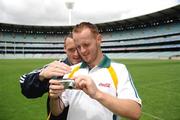 28 October 2008; Benny Coulter, Down, and Paddy Bradley, Derry, review photographs taken after an Ireland International Rules training session. 2008 International Rules tour, Melbourne Cricket Ground, Melbourne, Auatralia. Picture credit: Ray McManus / SPORTSFILE