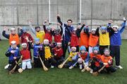 29 October 2008; Ulster Bank and Cork star Sean Og O hAilpin with the Raheny U12 hurling players who he put through their paces in Dublin today. The club won a coaching session with bank employee Sean Og as part of an Ulster Bank GAA promotion. The team braved the cold weather to get some tips from the Cork hurling legend. Raheny GAA Club, Dublin. Picture credit: Brian Lawless / SPORTSFILE