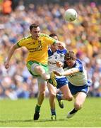 19 July 2015; Martin McElhinney, Donegal, in action against Ryan Wylie and Darren Hughes, right, Monaghan. Ulster GAA Football Senior Championship Final, Donegal v Monaghan, St Tiernach's Park, Clones, Co. Monaghan. Picture credit: Stephen McCarthy / SPORTSFILE