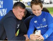 22 July 2015; Leinster rugby players Colm O'Shea and Gavin Thornbury visited the Bank of Ireland Summer Camp at Seapoint RFC to meet with young players. Pictured Gavin Thornbury poses for a 'selfie' with a camp participant. Seapoint RFC, Killiney, Co. Dublin. Picture credit: Sam Barnes / SPORTSFILE
