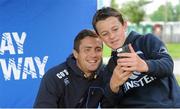 22 July 2015; Leinster rugby players Colm O'Shea and Gavin Thornbury visited the Bank of Ireland Summer Camp at Seapoint RFC to meet with young players. Pictured Colm O'Shea poses for a 'selfie' with a camp participant. Seapoint RFC, Killiney, Co. Dublin. Picture credit: Sam Barnes / SPORTSFILE