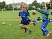 22 July 2015; Leinster rugby players Colm O'Shea and Gavin Thornbury visited the Bank of Ireland Summer Camp at Seapoint RFC to meet with young players. Pictured Camp participants playing keep ball. Seapoint RFC, Killiney, Co. Dublin. Picture credit: Sam Barnes / SPORTSFILE