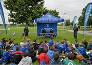 22 July 2015; Leinster rugby players Colm O'Shea and Gavin Thornbury visited the Bank of Ireland Summer Camp at Seapoint RFC to meet with young players. Pictured Gavin Thornbury and Colm O'Shea take questions from camp participants. Seapoint RFC, Killiney, Co. Dublin. Picture credit: Sam Barnes / SPORTSFILE