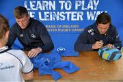 22 July 2015; Leinster rugby players Colm O'Shea and Gavin Thornbury visited the Bank of Ireland Summer Camp at Seapoint RFC to meet with young players. Pictured Gavin Thornbury and Colm O'Shea give autographs to camp participants. Seapoint RFC, Killiney, Co. Dublin. Picture credit: Sam Barnes / SPORTSFILE