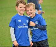 22 July 2015; Leinster rugby players Colm O'Shea and Gavin Thornbury visited the Bank of Ireland Summer Camp at Seapoint RFC to meet with young players. Pictured two camp participants pose for a photo. Seapoint RFC, Killiney, Co. Dublin. Picture credit: Sam Barnes / SPORTSFILE