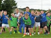 22 July 2015; Leinster rugby players Colm O'Shea and Gavin Thornbury visited the Bank of Ireland Summer Camp at Seapoint RFC to meet with young players. Seapoint RFC, Killiney, Co. Dublin. Picture credit: Sam Barnes / SPORTSFILE