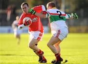 2 November 2008; Bryan Carbery, Eire Og, in action against Jeffrey Birmingham, Kiltegan. AIB Leinster Senior Club Football Championship, Eire Og v Kiltegan, Dr. Cullen Park, Carlow. Picture credit: Pat Murphy / SPORTSFILE