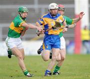 in the Galway senior club final at Pearse stadium, Galway. Picture Ray Ryan/ Sportsfile *** Local Caption *** 2 November 2008; Niall Hayes, Portumna, in action against Tadgh and Sylvie Og Linnane, Gort. Galway Senior Hurling Final, Portumna v Gort, Pearse Stadium, Galway. Picture credit: Ray Ryan / SPORTSFILE