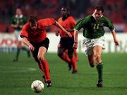 2 September 2000; Kevin Kilbane Republic of Ireland in action against Bert Konterman of Holland during the World Cup Internaltional Championship Qualifing match between Holland and the Republic of Ireland at Amsterdam Arena in Amsterdam, Holland. Photo by David Maher/Sportsfile